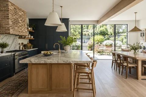 Renovated kitchen and dining space opening onto a garden