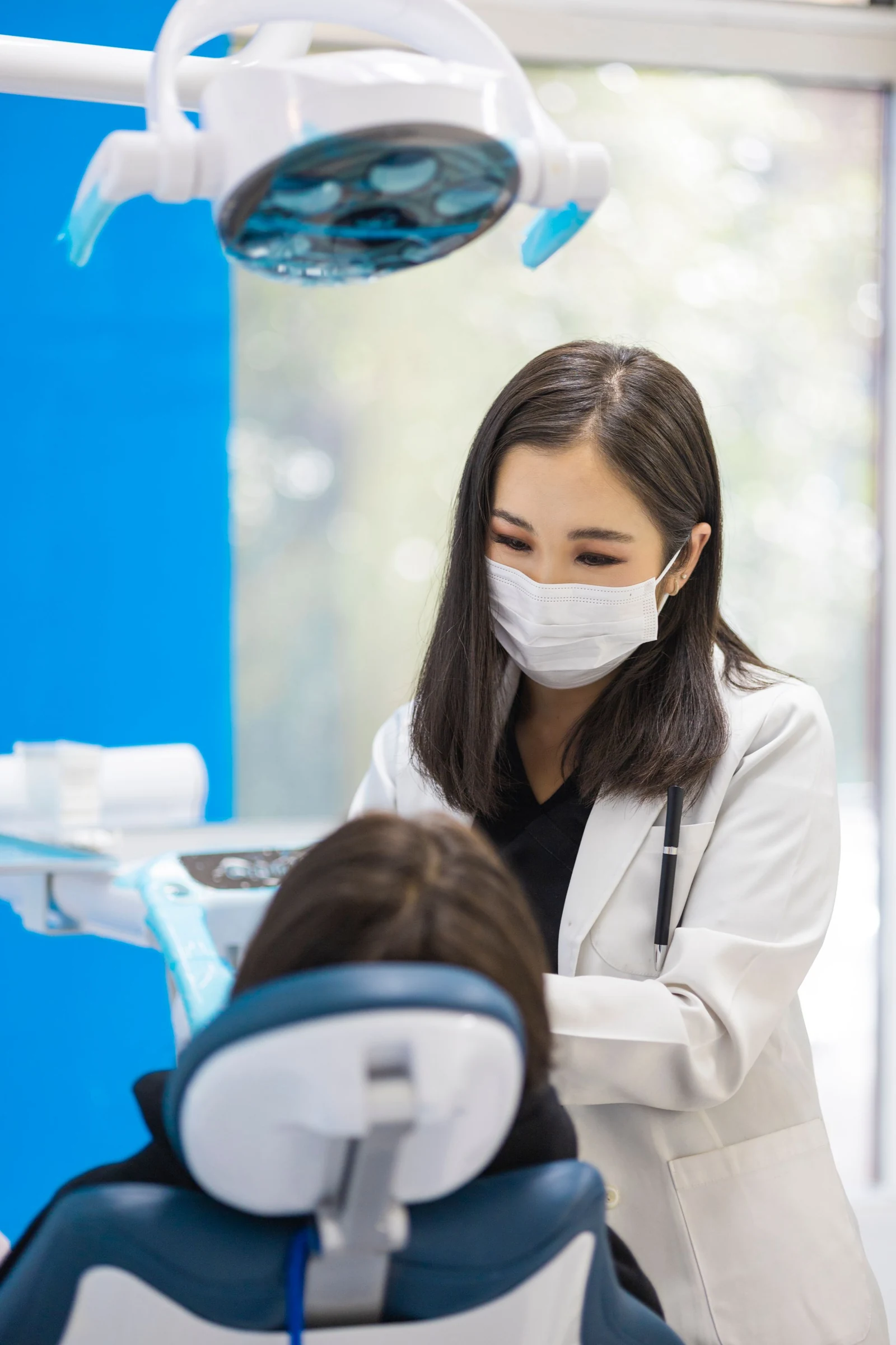 Dentist caring for a patient in a clinic