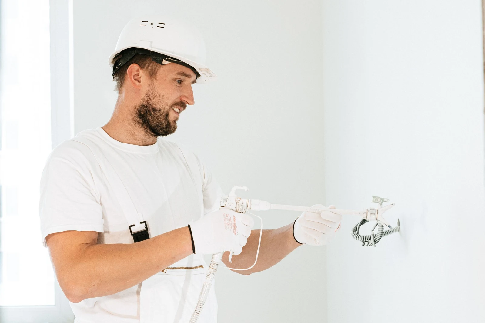 Electrician installing wiring in a building