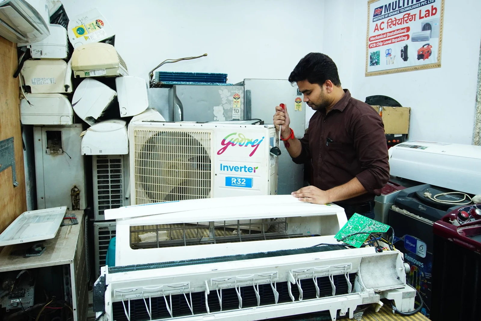 Air conditioning unit being repaired in a workshop