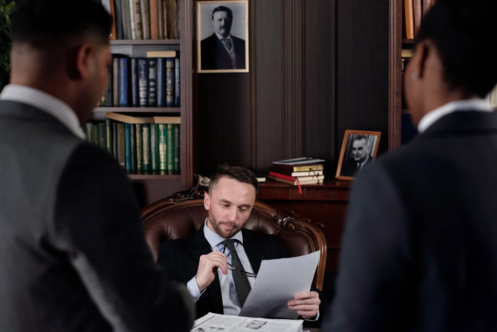 Professionals discussing legal documents